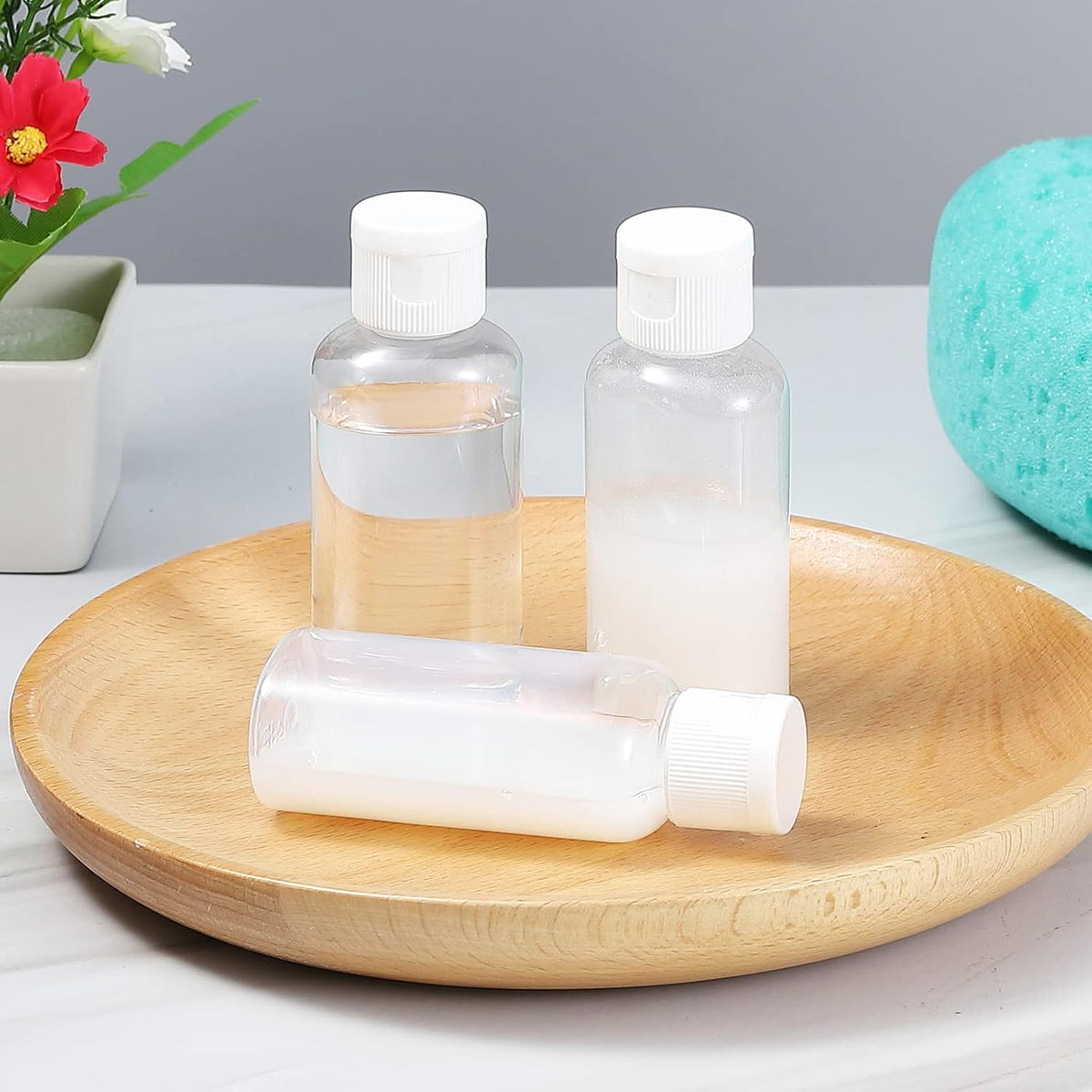 100 Pcs 1.7 oz Clear Travel Bottles with Flip Caps for Toiletries