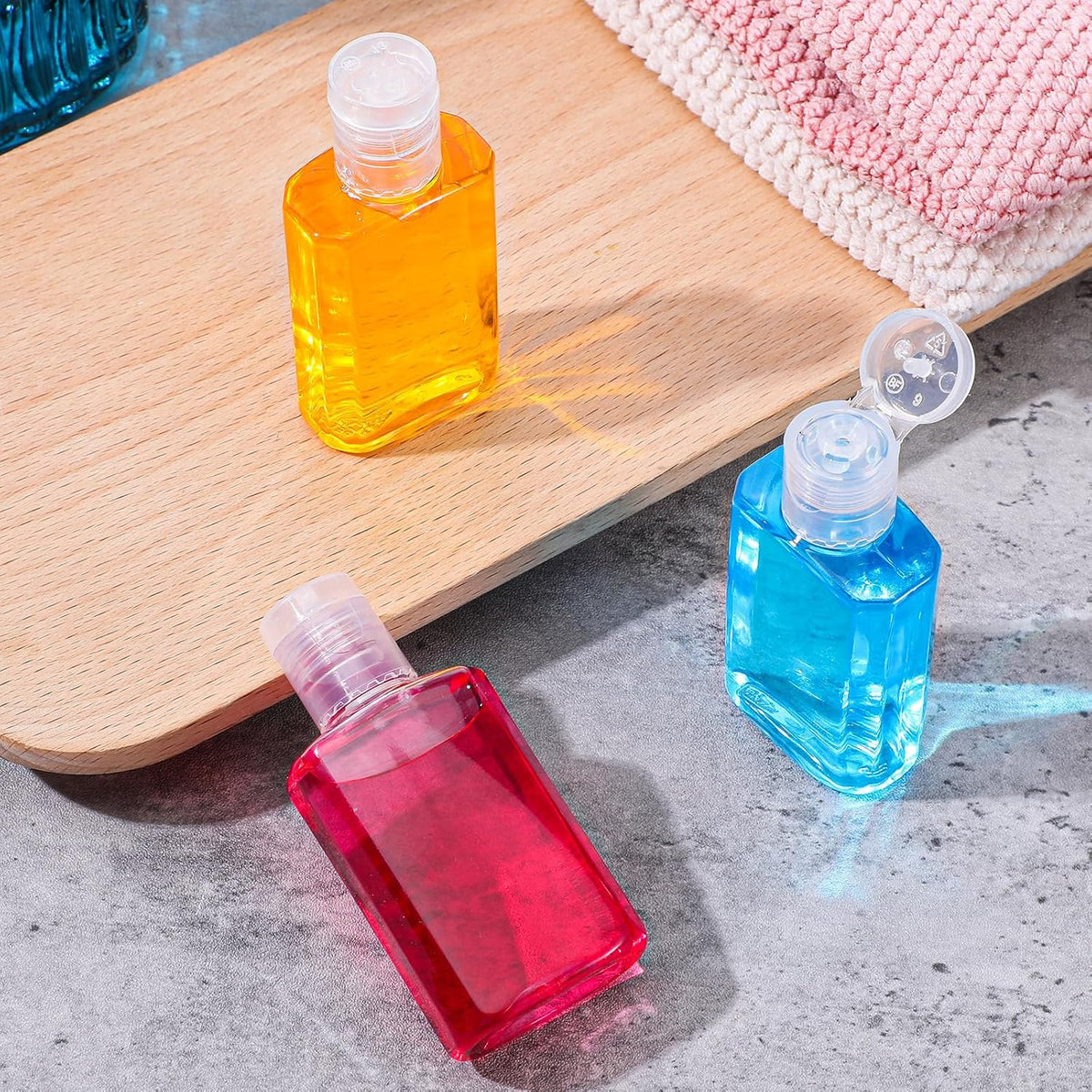 100 Pcs 1 oz Clear Plastic Travel Bottles, Empty Refillable Bottles with Flip Caps, Portable Containers for Business Trip, Outdoor Camping, Shampoo, Lotion and More